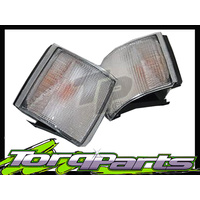 INDICATORS PAIR SUIT HOLDEN COMMODORE VH VK 81-86 CLEAR CORNER LAMPS BLINKERS