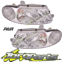 HEADLIGHTS PAIR SUIT HOLDEN COMMODORE VT HEADLAMPS HEAD LIGHT LAMPS